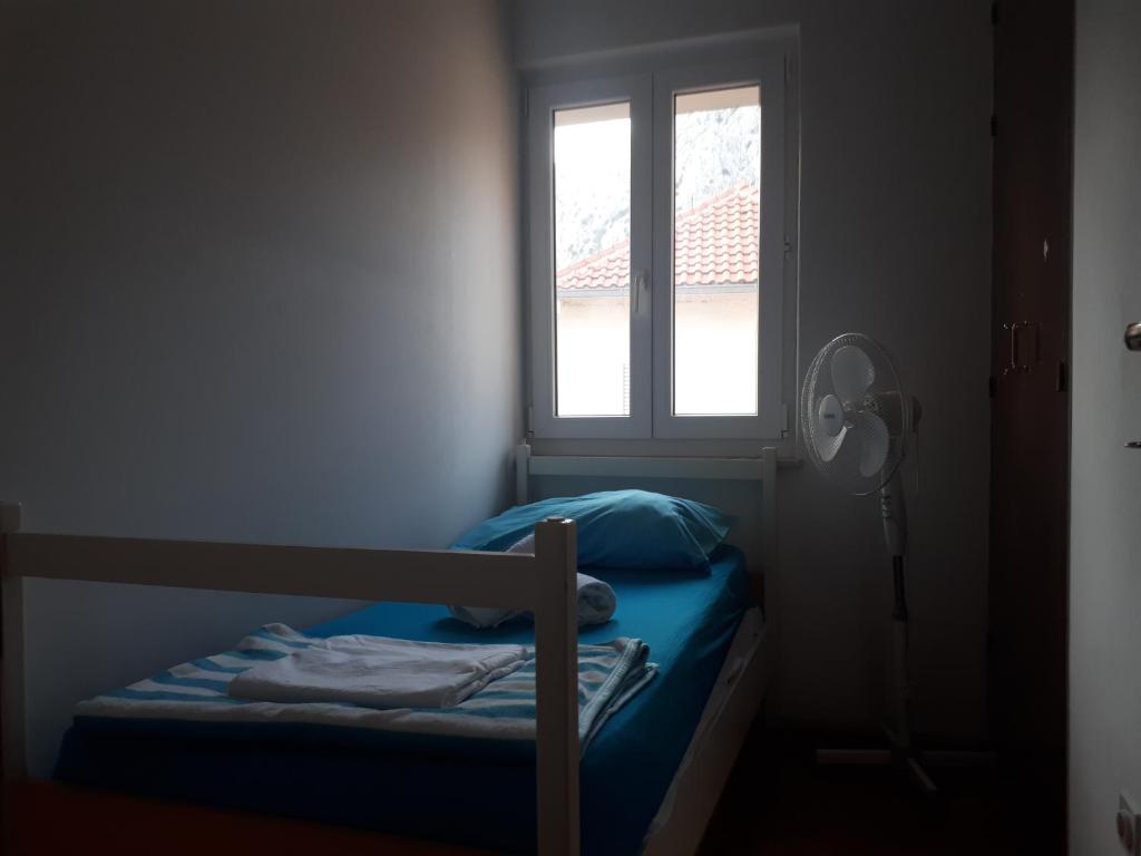 Posteľ alebo postele v izbe v ubytovaní Hostel Omiš