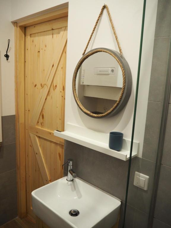 Kúpeľňa v ubytovaní Apartament z widokiem w centrum Starego Miasta