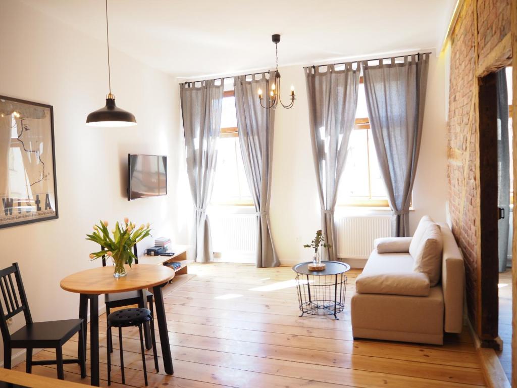 Posedenie v ubytovaní Apartament z widokiem w centrum Starego Miasta
