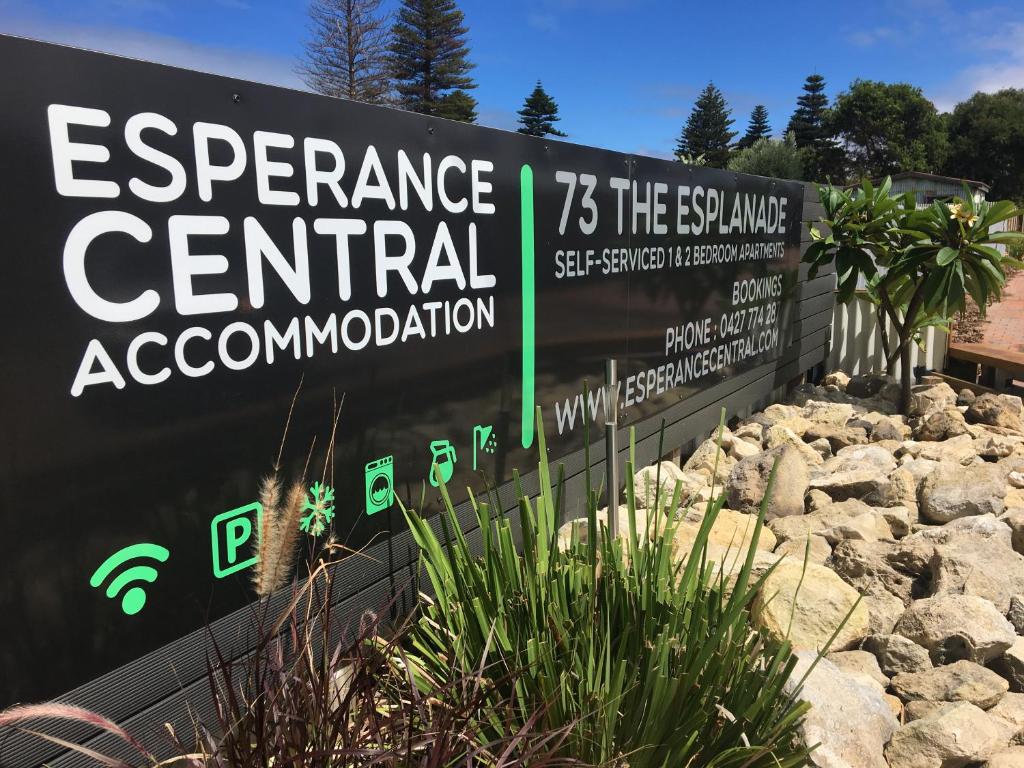 a sign for the entrance to a central association at Esperance Central Accommodation in Esperance