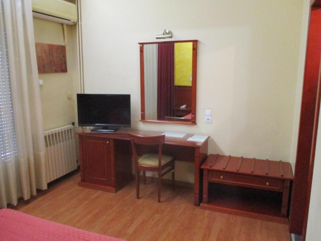 TV a/nebo společenská místnost v ubytování Hotel Delta