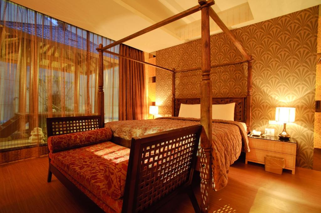 Postel nebo postele na pokoji v ubytování Zhen 13 Villa Motel