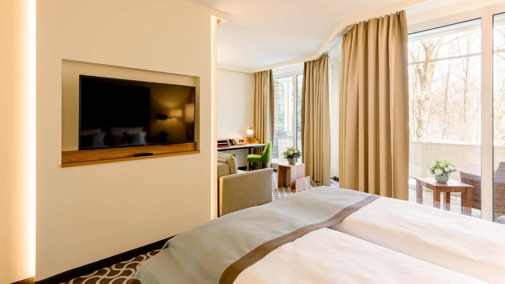 Postel nebo postele na pokoji v ubytování Parkhotel Rothof