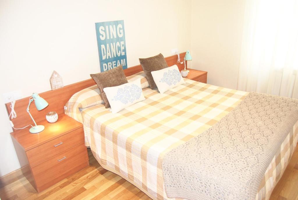 Posteľ alebo postele v izbe v ubytovaní Apartamentos Turisticos ARCH