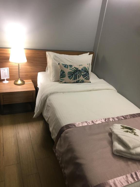 Postel nebo postele na pokoji v ubytování Hotel Gaia 95