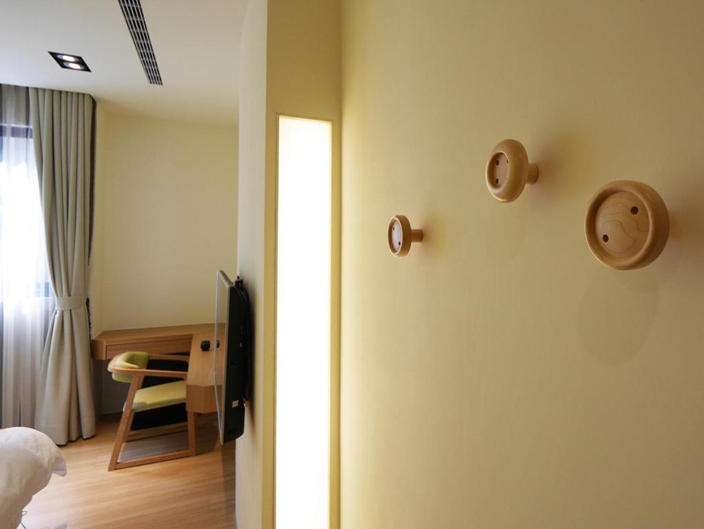 Postel nebo postele na pokoji v ubytování See Moon Homestay