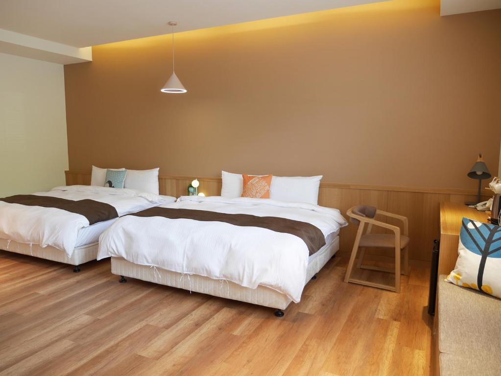 Postel nebo postele na pokoji v ubytování See Moon Homestay