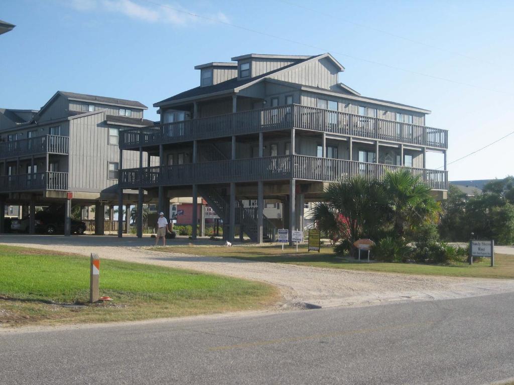 a large building on the side of a road at Sandy Shores West 101 in Gulf Shores