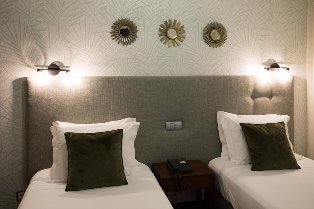 Postel nebo postele na pokoji v ubytování Belem Hotel
