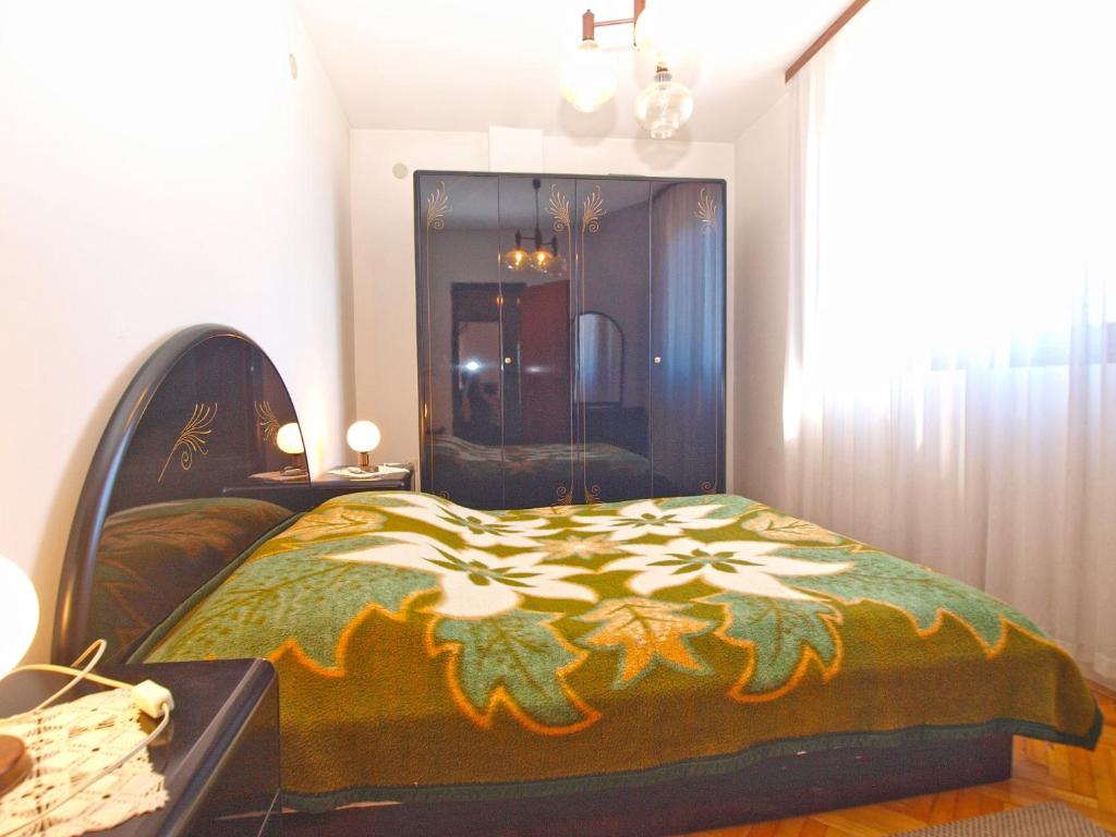 Postel nebo postele na pokoji v ubytování Apartments Franko 1586