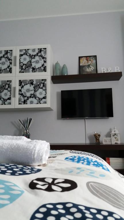 A bed or beds in a room at B&B A casa dell'artista