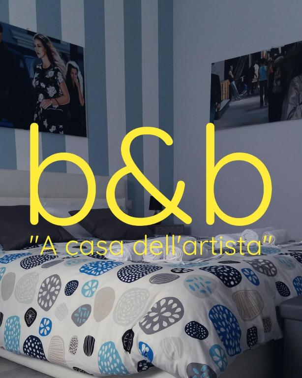 A bed or beds in a room at B&B A casa dell'artista
