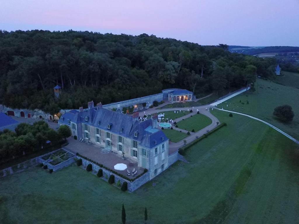 an aerial view of a large house with a yard at Château d'Hodebert in Saint-Paterne-Racan