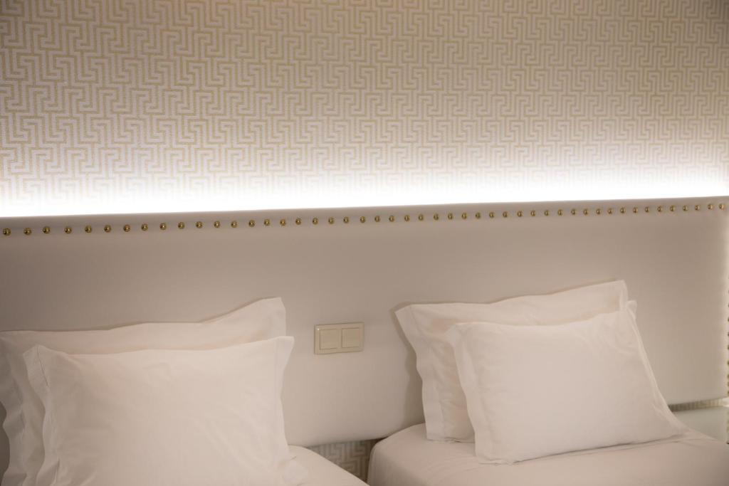 Postel nebo postele na pokoji v ubytování Belem Hotel