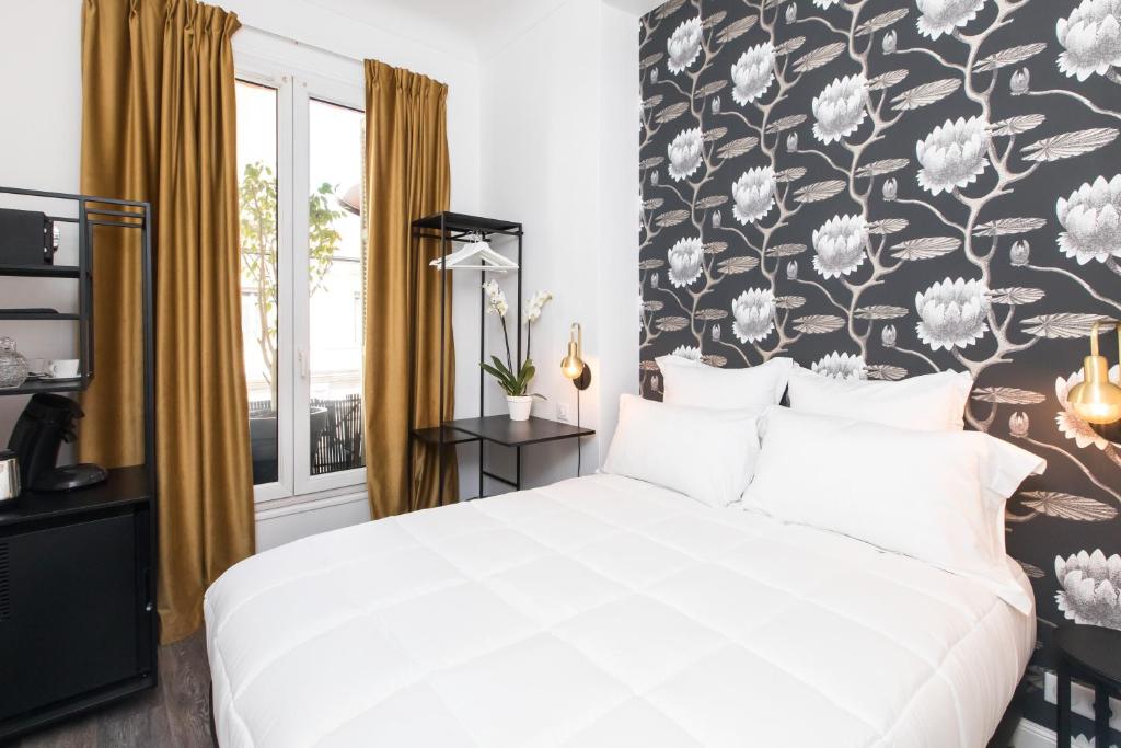 Postel nebo postele na pokoji v ubytování Arome Hotel