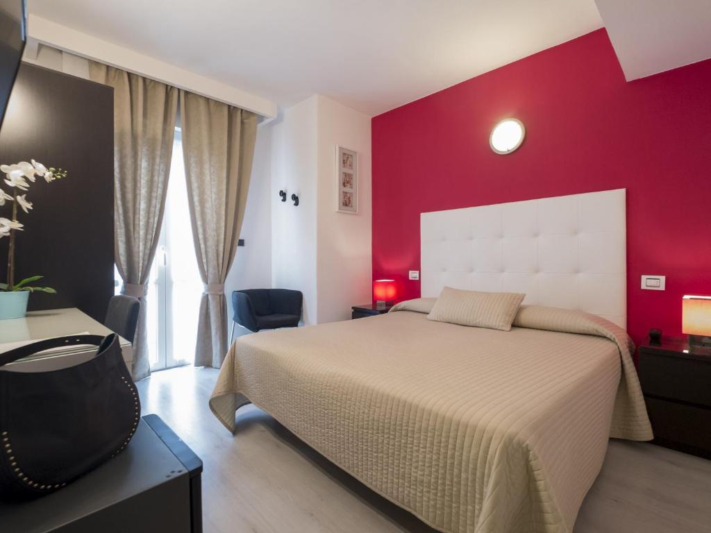 Postel nebo postele na pokoji v ubytování Hotel Levante