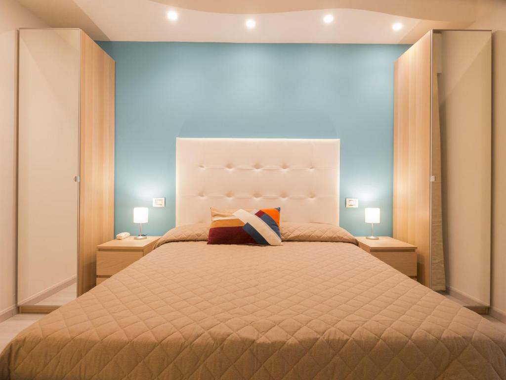 Postel nebo postele na pokoji v ubytování Hotel Levante