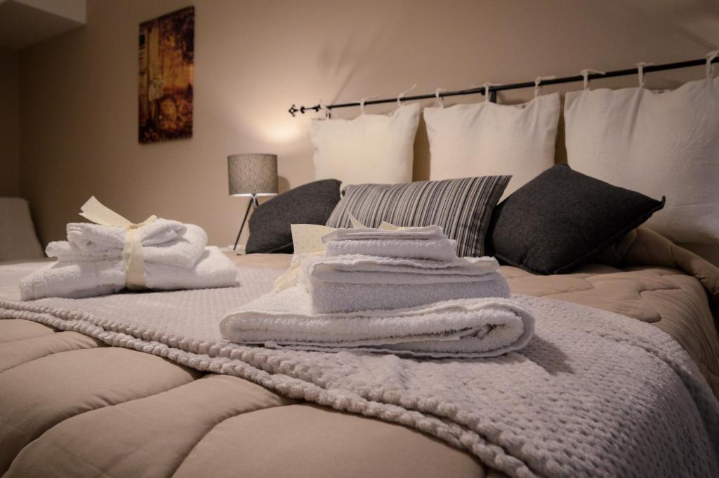 Postel nebo postele na pokoji v ubytování La Fara B&B