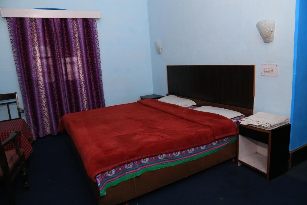 Voodi või voodid majutusasutuse Prince Hotel Mallroad toas