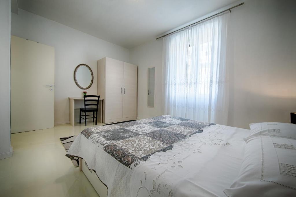 Postel nebo postele na pokoji v ubytování Apartment Jure