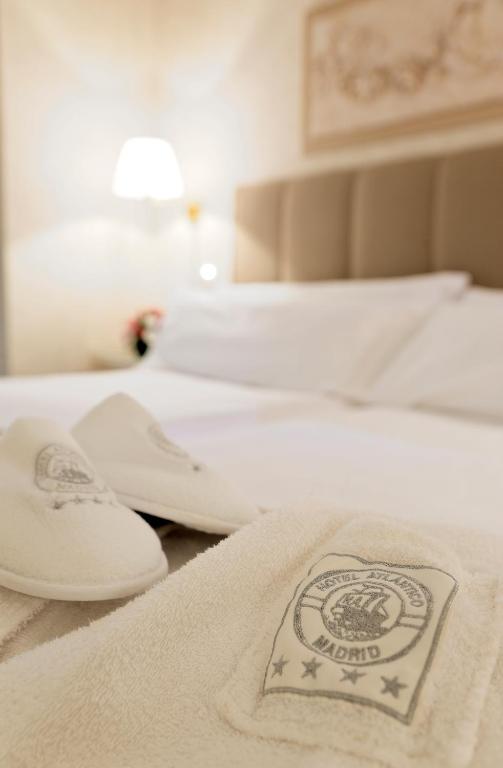 Postel nebo postele na pokoji v ubytování Hotel Atlántico