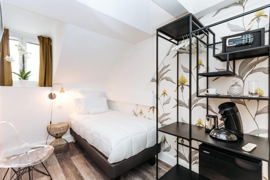 Postel nebo postele na pokoji v ubytování Arome Hotel
