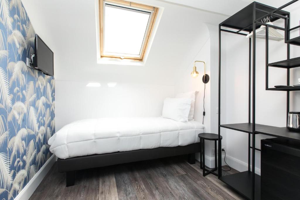 Postel nebo postele na pokoji v ubytování Arome Hotel
