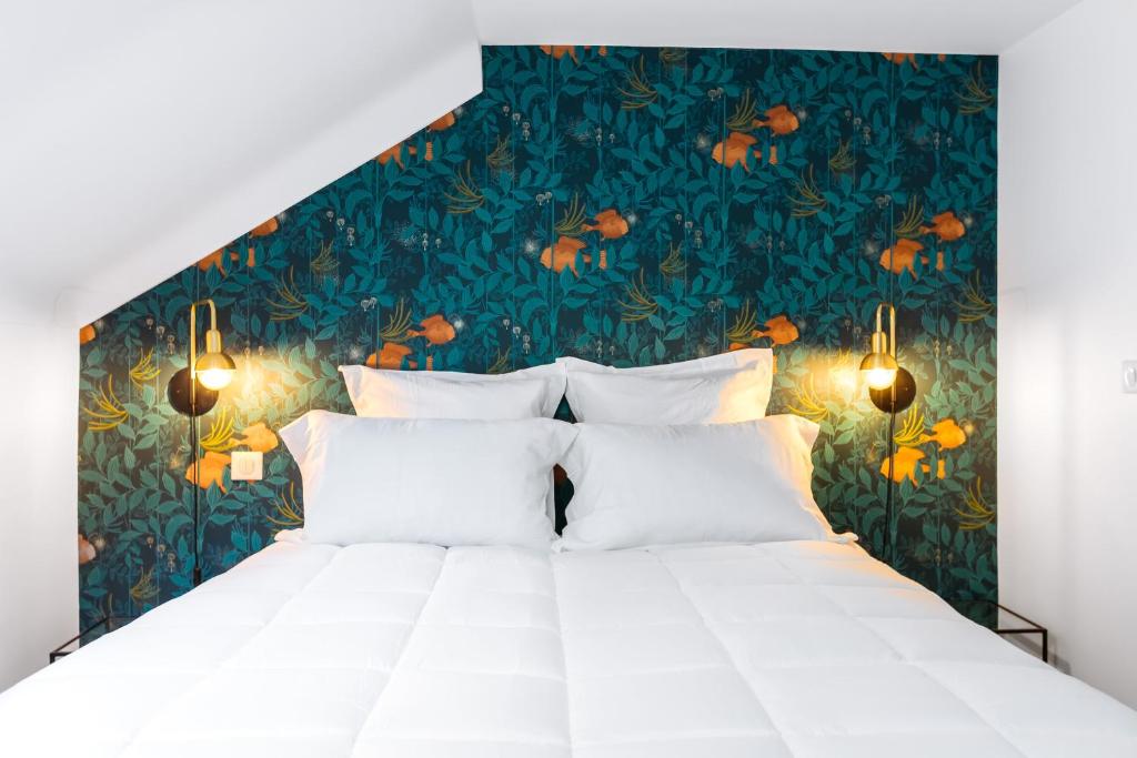 Postel nebo postele na pokoji v ubytování Arome Hotel