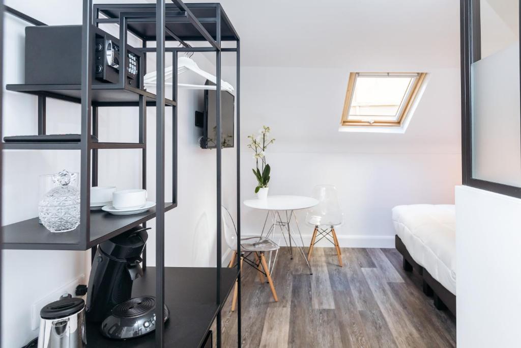 Postel nebo postele na pokoji v ubytování Arome Hotel