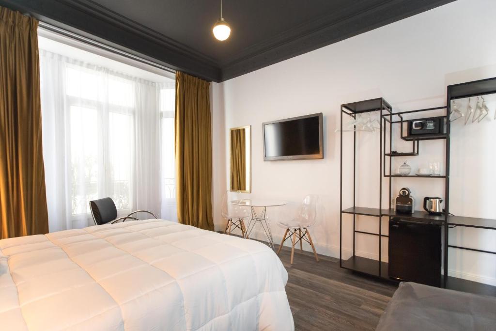 Postel nebo postele na pokoji v ubytování Arome Hotel