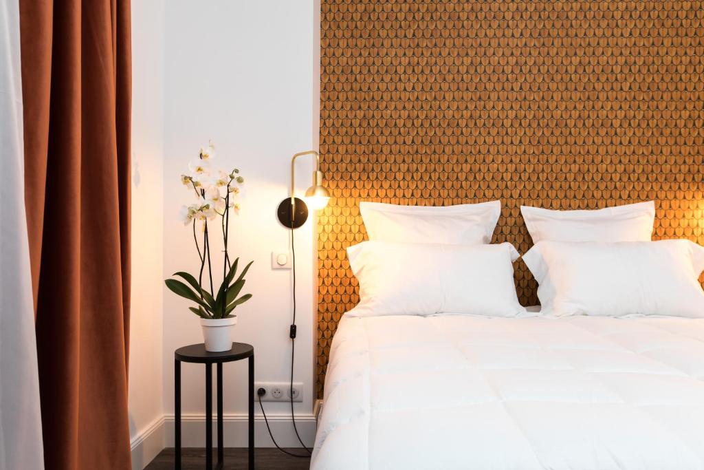 Postel nebo postele na pokoji v ubytování Arome Hotel