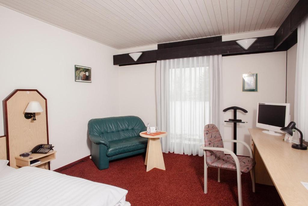TV a/nebo společenská místnost v ubytování Hotel Abendroth