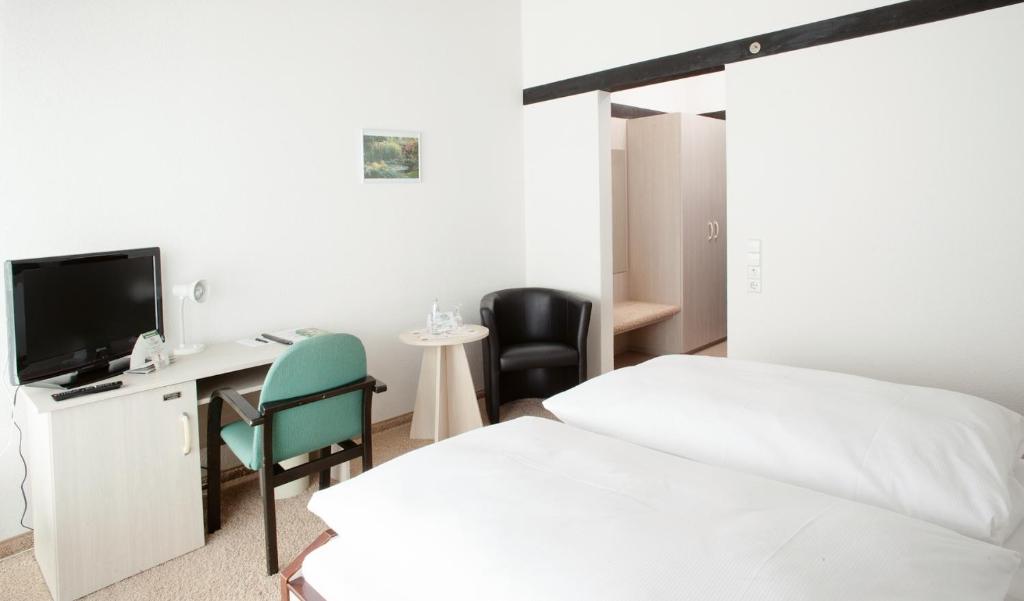 TV a/nebo společenská místnost v ubytování Hotel Abendroth