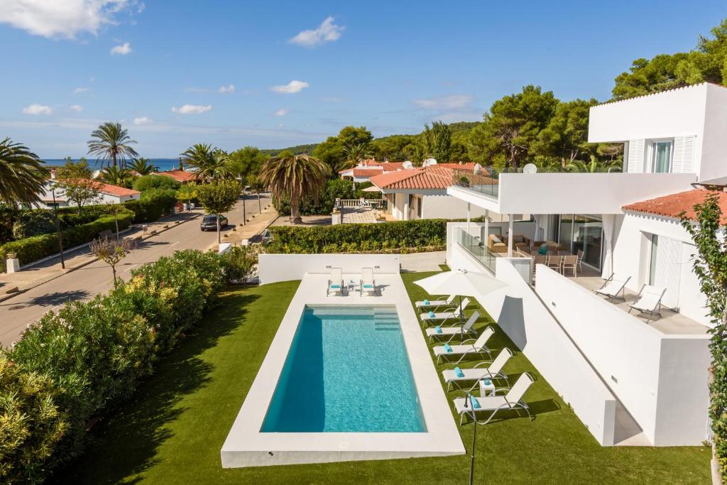 an aerial view of a villa with a swimming pool at VILLA LUCIA B17 in Santo Tomás