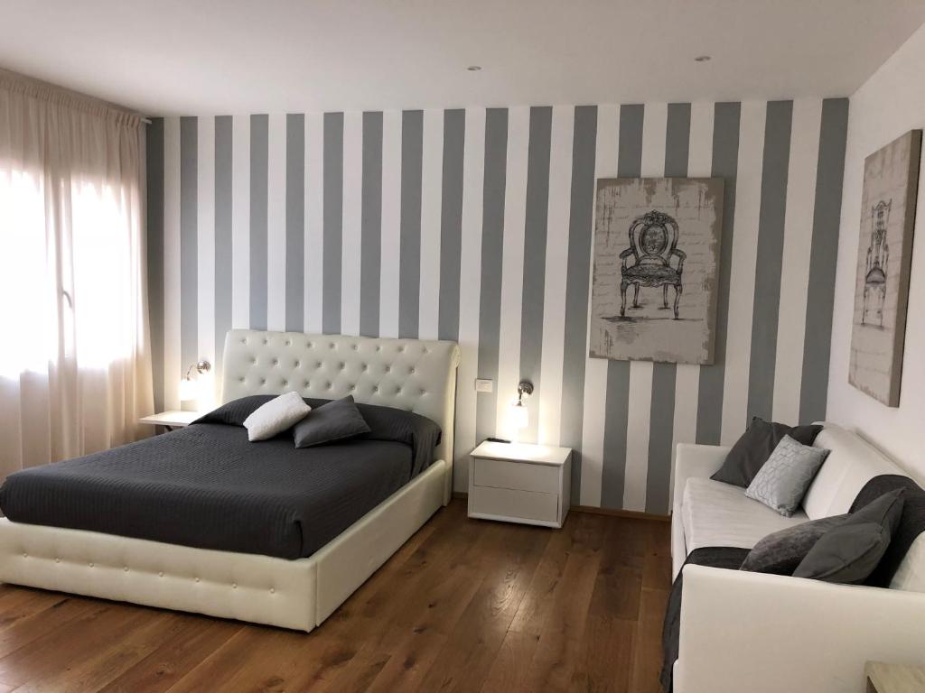 Posteľ alebo postele v izbe v ubytovaní Le Dimore del Borgo
