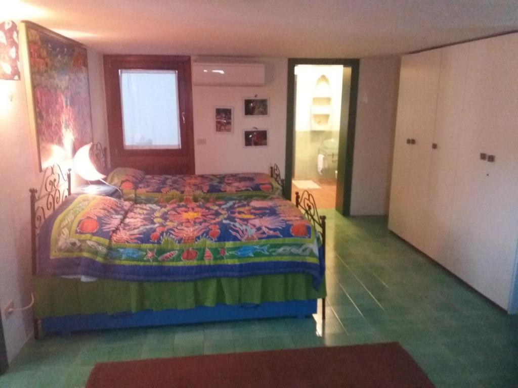 Postel nebo postele na pokoji v ubytování Villa Timothy