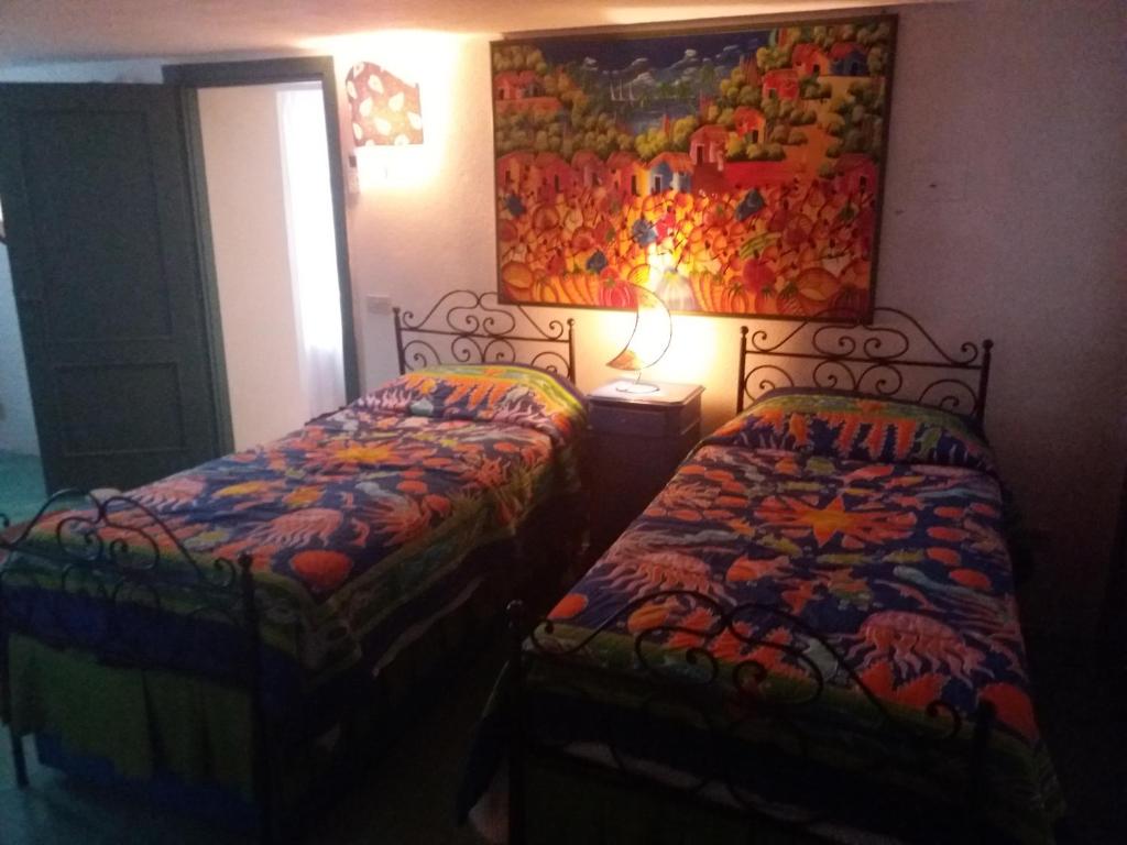Postel nebo postele na pokoji v ubytování Villa Timothy