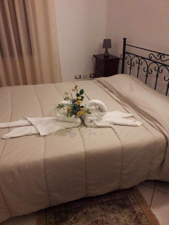 Postel nebo postele na pokoji v ubytování Sciacca Bed and Breakfast Natoli