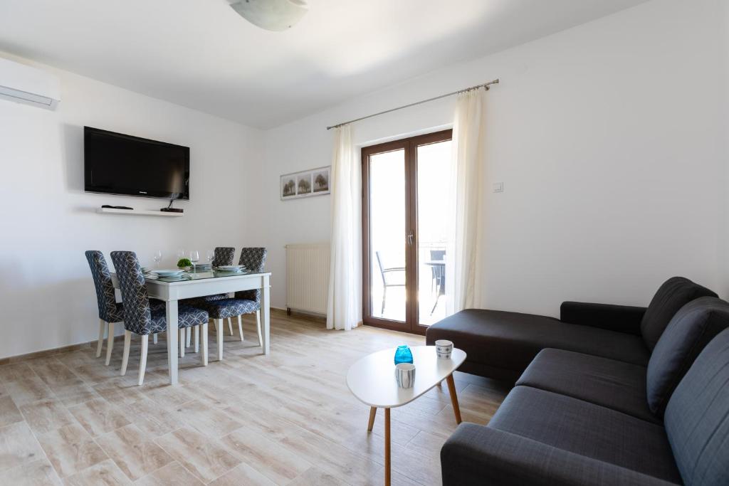 TV o dispositivi per l'intrattenimento presso Apartments Miramar