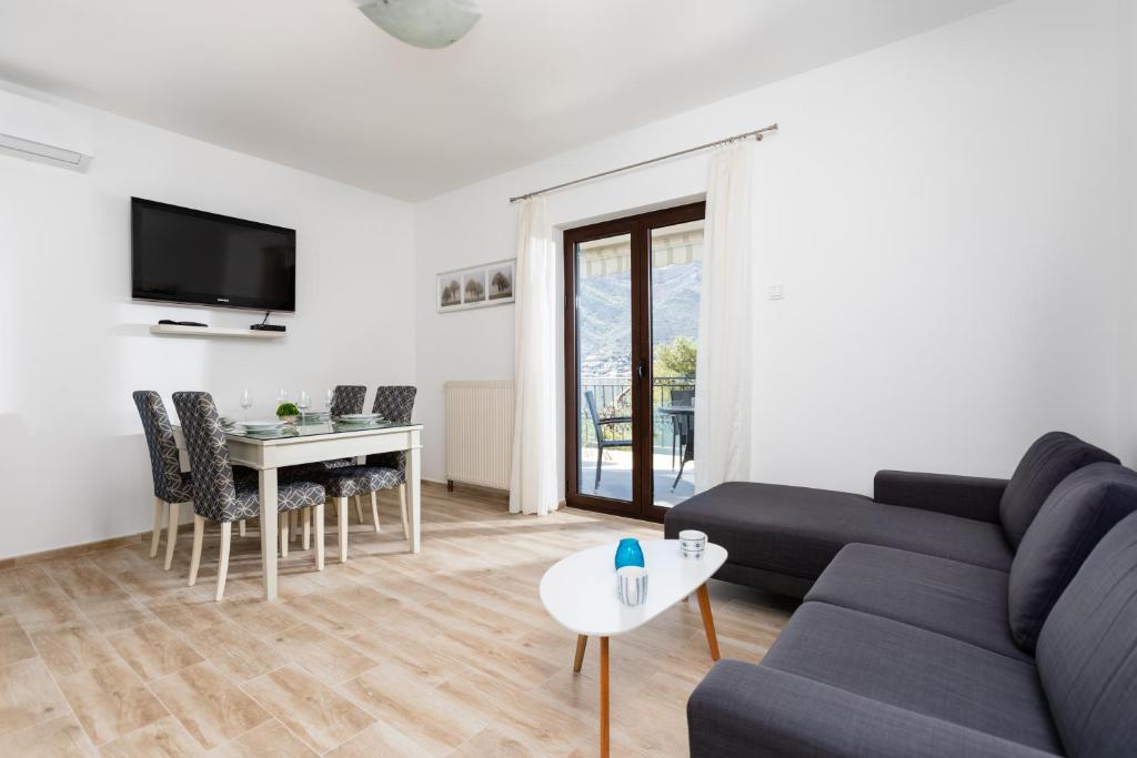 TV o dispositivi per l'intrattenimento presso Apartments Miramar