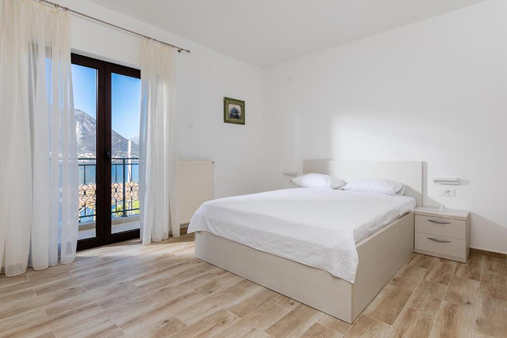 Letto o letti in una camera di Apartments Miramar