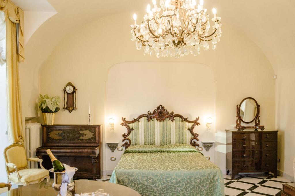 Postel nebo postele na pokoji v ubytování Relais La Rupe