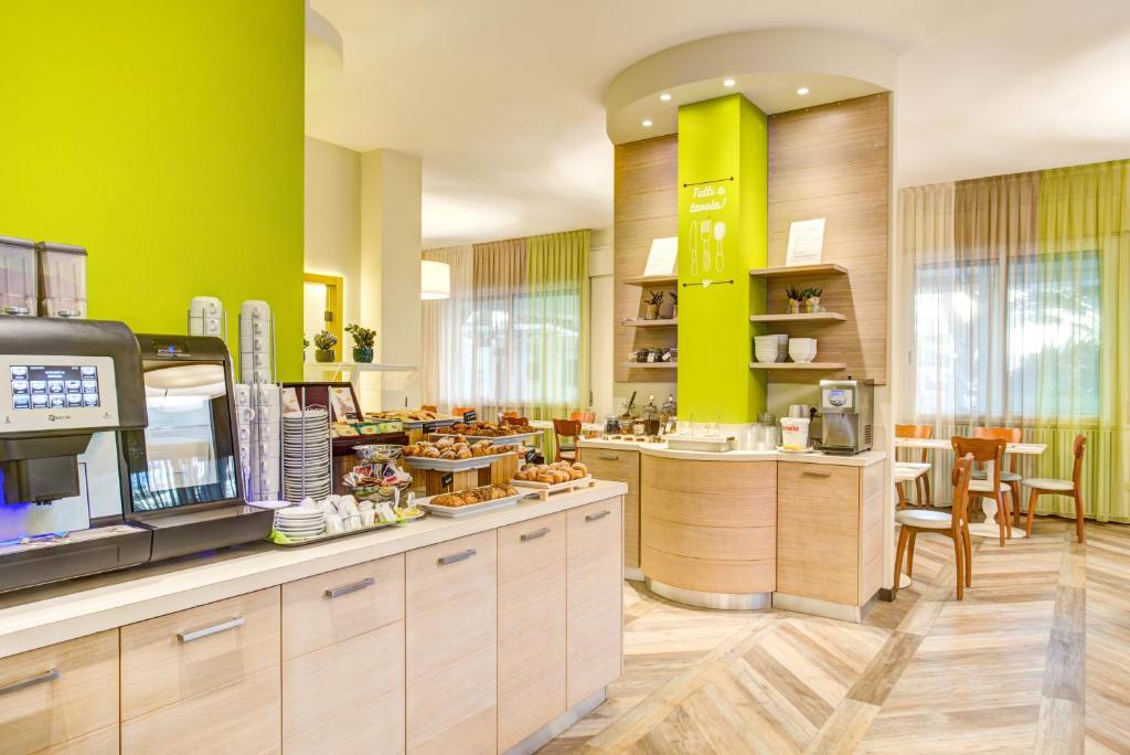 Kuchyň nebo kuchyňský kout v ubytování Hotel Fabrizio
