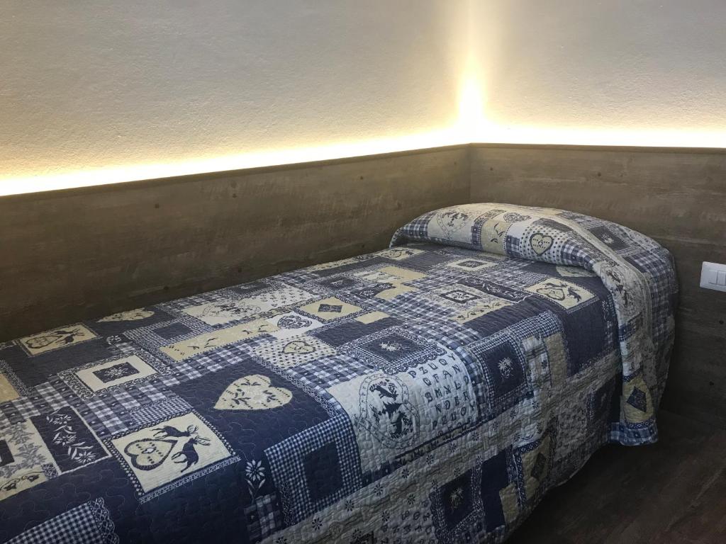 Postel nebo postele na pokoji v ubytování Le Servite Apartments