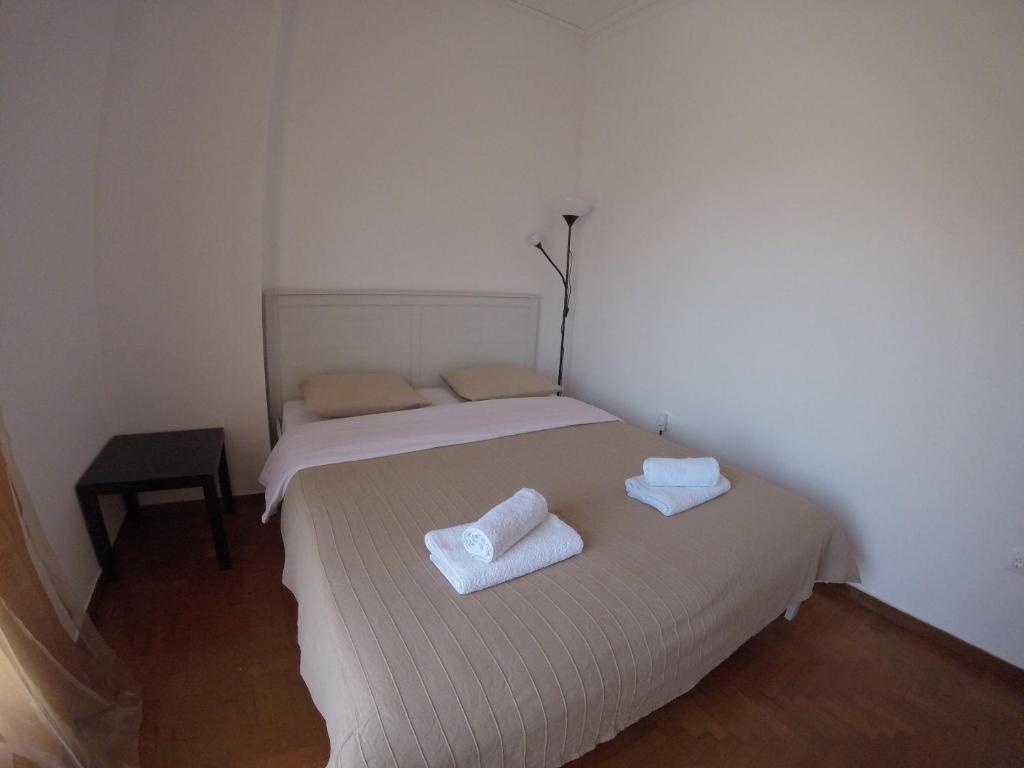 Posteľ alebo postele v izbe v ubytovaní Sfiggos 54 Guest House