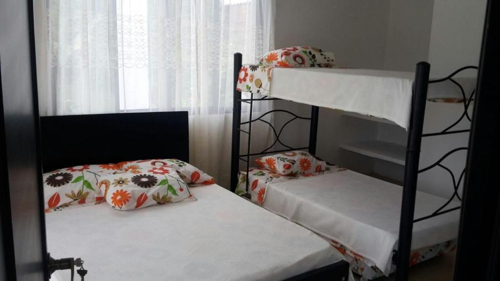 Postel nebo postele na pokoji v ubytování La orquídea