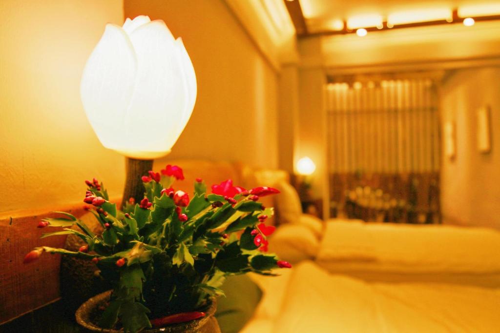 Postel nebo postele na pokoji v ubytování Yunlu Lianxin Guesthouse