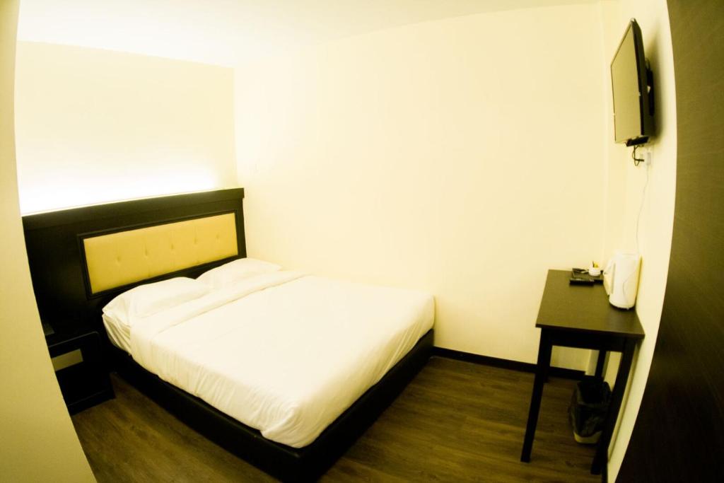 Postel nebo postele na pokoji v ubytování Hotel Zuhra