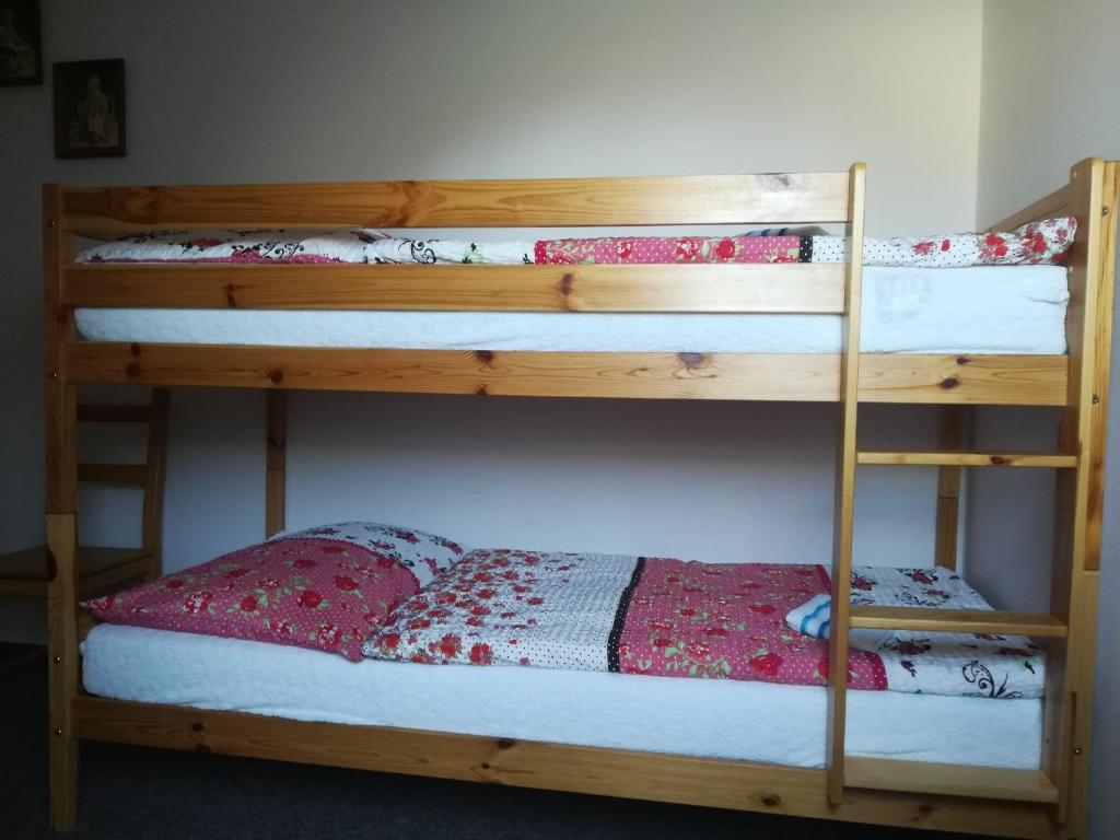 Postel nebo postele na pokoji v ubytování Penzion U Jindry