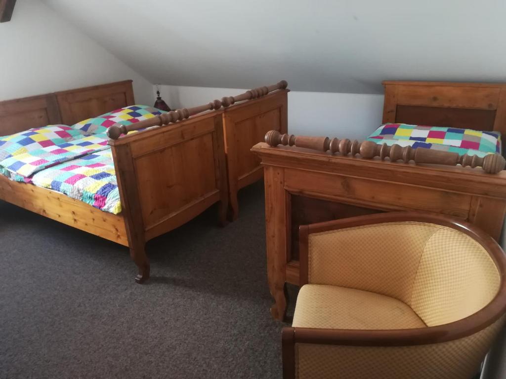 Postel nebo postele na pokoji v ubytování Penzion U Jindry